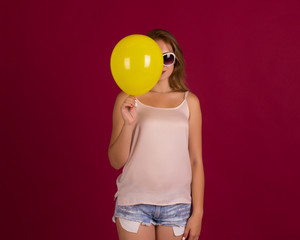 Young pretty girl with balloon, party  