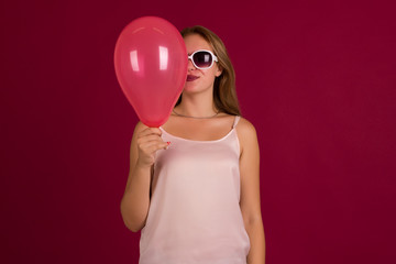 Young pretty girl with balloon, party  