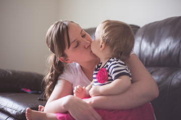 Mother and daughter in living room