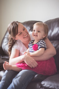 Mother and daughter in living room