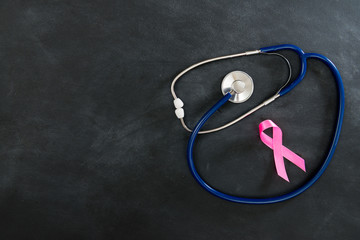 stethoscope with breast cancer symbol sign ribbon