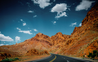 Arid landscape in Arizona. Rocks and the road