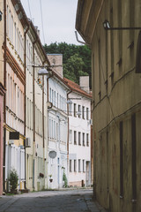 Fototapeta na wymiar Narrow empty street in old town of Kaunas city
