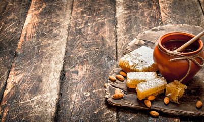 Fresh honey with almonds.
