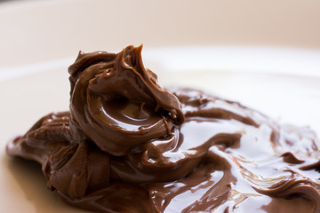 chocolate hazelnut spread on plate. Close up