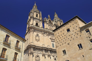 Fototapeta na wymiar Salamanca Clerecia church and Casa Conchas shell house in Spain