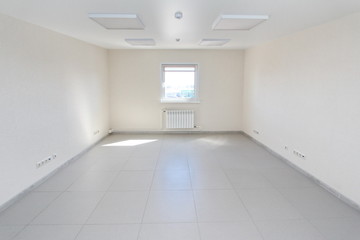 Interior empty office light room with white wallpaper unfurnished in a new building