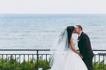 Beautiful bride and groom couple walking at the wedding