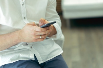 Man using smartphone at coffee shop