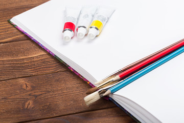 Desk cluttered with office supplies