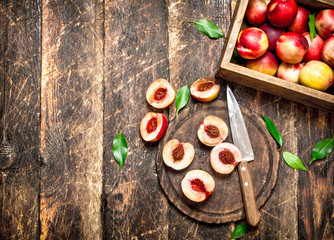 Ripe peaches on a cutting Board.