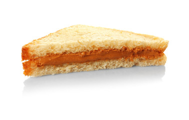 Tasty sandwich with creamy peanut butter on white background