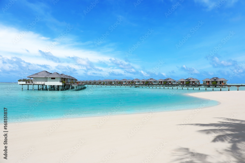 Canvas Prints modern beach houses on piles at tropical resort