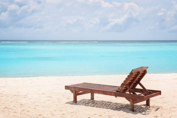 Sun lounger on beach at sea resort