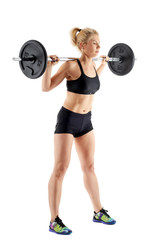 Obraz premium Woman doing barbell squats
