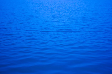 Blur image of the river, lake, sea or ocean. Abstract background.