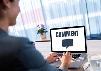 Comment text and chat graphic on tablet screen with womans hands