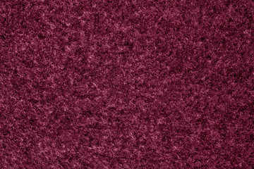 Pink color felt texture.