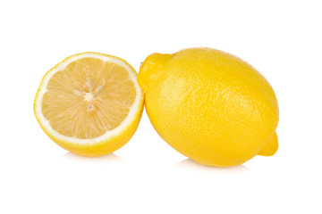 whole and half cut fresh lemon on white background