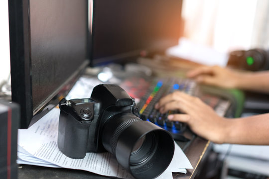 Photographer Editing And Retouch Photos With Camera, Double Screen At Home