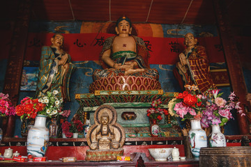 Colourful altar with Buddha in a Chinese Buddhist temple