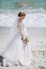Fototapeta na wymiar Portrait of a beautiful bride on wedding day