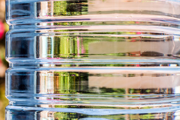plastic water bottle in a back yard 