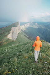 Fototapeta premium Hiker walking on mountain ridge.