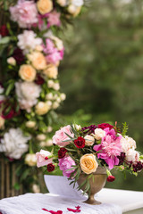 flowers in vases on wedding ceremony