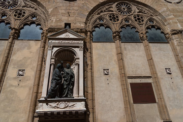 Gothic design of the facade of Orsanmichele church in Florence, Tuscany, Italy