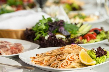 Pancakes with red caviar