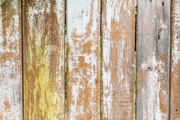 Part of an old wooden fence with weathered planks, abstract texture