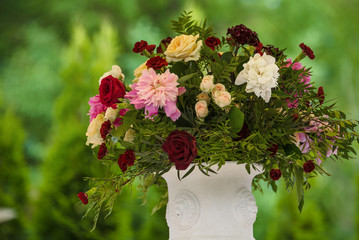 flowers in vases on wedding ceremony