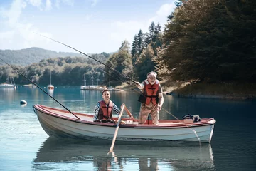 Zelfklevend Fotobehang Two men relaxing and fishing © gpointstudio