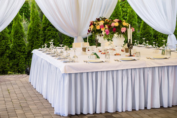 Decorated and served party banquet table outdoor