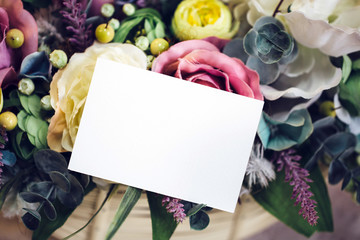 delicate floral bouquet with blank card for text