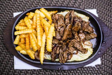 Grilled Mongolian Beef with fries