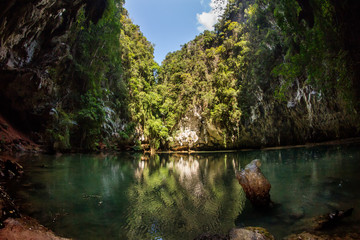 Railay Princess Lagoon - small beautiful lake connected underground to the sea. Hidden between karsts cliff. Krabi Province, Thailand. © Ilya Sviridenko