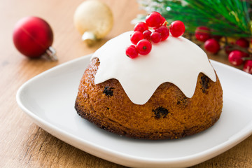 Christmas pudding on wooden table
