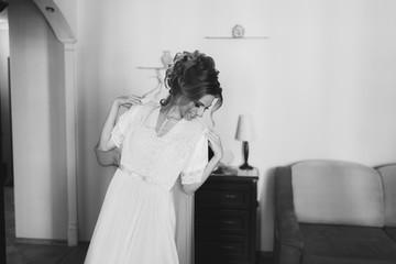 Beautiful bride in the morning dresses for a wedding ceremony