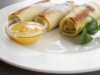 Pancakes stuffed with curd