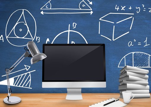 Computer Desk foreground with blackboard graphics of mathematica