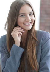 successful business woman on blurred background office