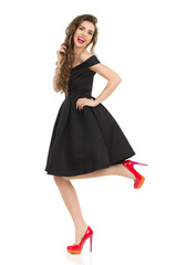 Elegant Young Woman Is Running And Smiling