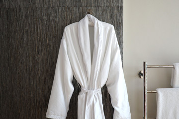 Robe and towel in luxury hotel room