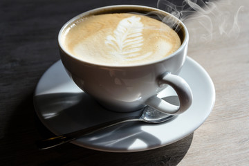 Cup of hot cappuccino coffee