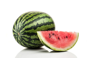watermelon with slices standing isolated on white background