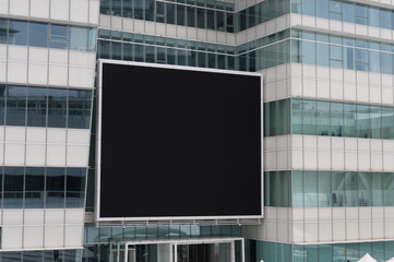 Large blank billboard on a street wall, banners with room to add your own text