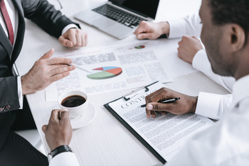 african american businessman with cup of coffee