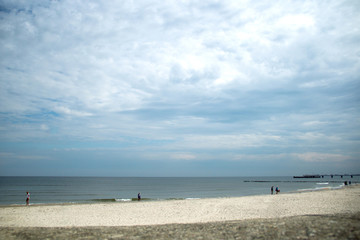 Fototapeta na wymiar Beach, blue sky, sea and sand